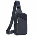 Sac bandoulière 18 x 7 x 30 cm en textile synthétique bleu marine avec poches zippées
